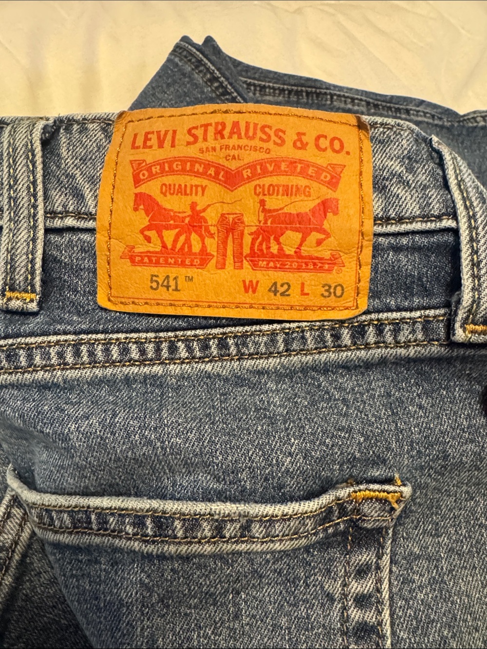 Levi's Relaxed Fit Jeans in Blue with Tan Patch